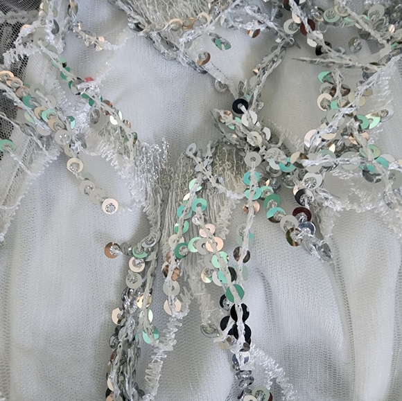 Sparkly one sleeve white and sequin top. - Picture 2 of 3